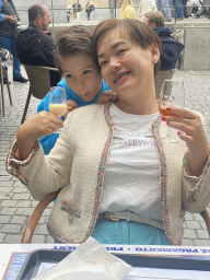 Miaomiao and Max with drinks at the terrace of the Flor de São Bento bakery at the Praça de Almeida Garrett square