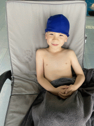 Max on a sunbed at the swimming pool at the Hotel Vila Galé Porto
