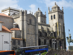 The north side of the Porto Cathedral and the equestrian statue of Vímara Peres at the Calçada de Vandoma street, viewed from the sightseeing bus at the Avenida Dom Afonso Henriques street