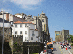 The north side of the Porto Cathedral, the equestrian statue of Vímara Peres and the Antiga Casa da Câmara building at the Calçada de Vandoma street, viewed from the sightseeing bus at the Rua de Saraiva de Carvalho street