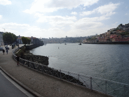 The Rua de Monchique street, boats on the Douro river and Vila Nova de Gaia, viewed from the sightseeing bus