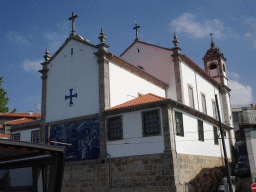 The southwest side of the Igreja Paroquial de Massarelos church at the Cais das Pedras street, viewed from the sightseeing bus on the Viaduto do Cais das Pedras viaduct