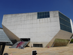 The south side of the Casa da Música theatre at the Avenida da Boavista street, viewed from the sightseeing bus