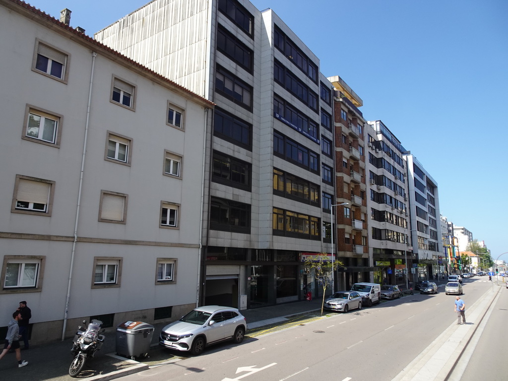 Front of buildings at the Avenida da Boavista street, viewed from the sightseeing bus