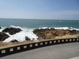 Rocks at the Praia dos Ingleses beach, viewed from the sightseeing bus on the Rua Cel. Raúl Peres street