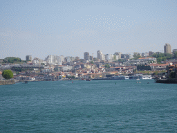 Boats on the Douro river and Vila Nova de Gaia, viewed from the sightseeing bus on the Viaduto do Cais das Pedras viaduct