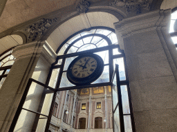 Clock above the west entrance to the Pátio das Nações courtyard at the Palácio da Bolsa palace