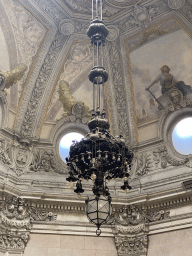 Chandeleer and ceiiling above the Noble Staircase at the west side of the Palácio da Bolsa palace