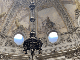 Chandeleer and ceiling above the Noble Staircase at the west side of the Palácio da Bolsa palace