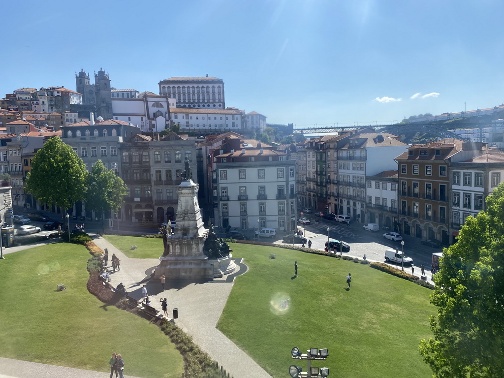 The Praça do Infante D. Henrique square with the statue of Infante D. Henrique, the towers of the Igreja dos Grilos church and the Porto Cathedral, the Paço Episcopal do Porto palace and the Ponte Luís I bridge, viewed from the Former Presidents Gallery at the southeast side of the upper floor of the Palácio da Bolsa palace