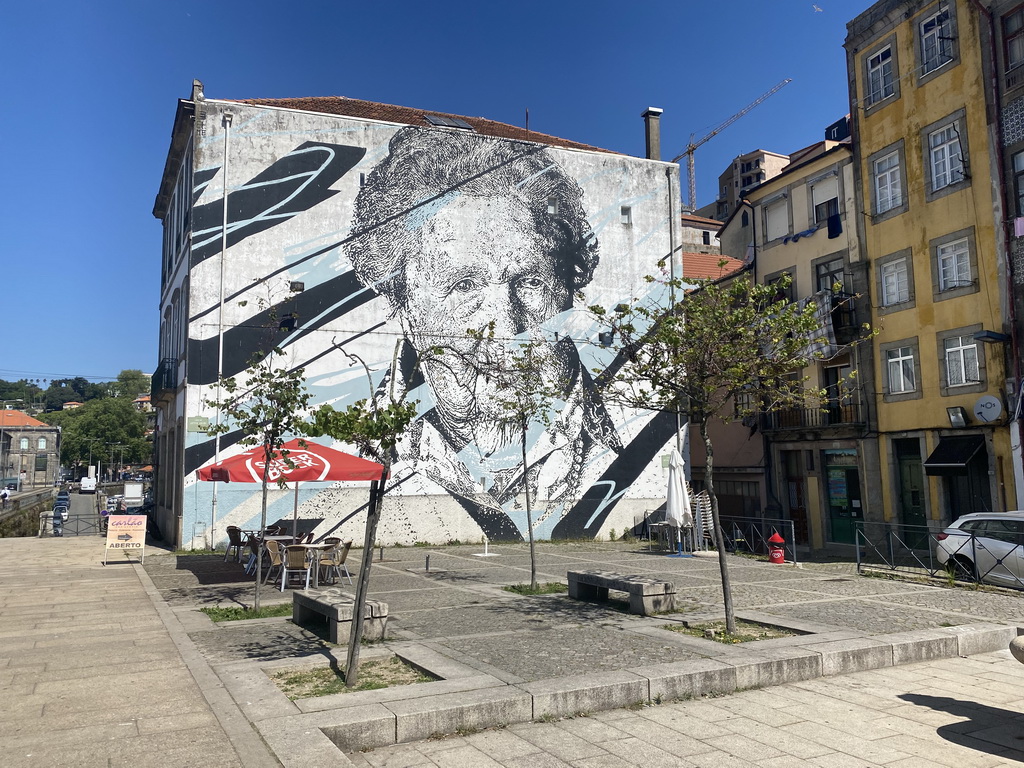 Mural painting `Mira` by Daniel Eime at the Largo de Artur Arcos square