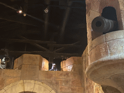 Walls with warrior statues and cannons at the Conquering Ceuta section of the boat ride at the World of Discoveries museum