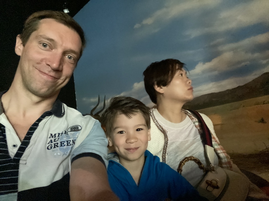 Tim, Miaomiao and Max at the boat ride at the World of Discoveries museum