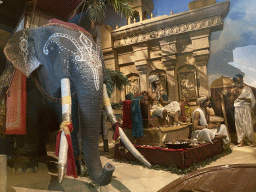 Elephant and merchant statues at the India section of the boat ride at the World of Discoveries museum
