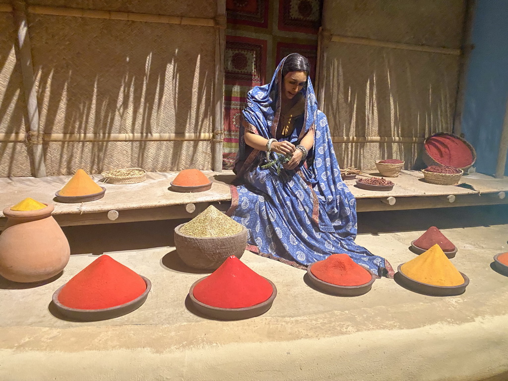 Female statue and spices at the India section of the boat ride at the World of Discoveries museum