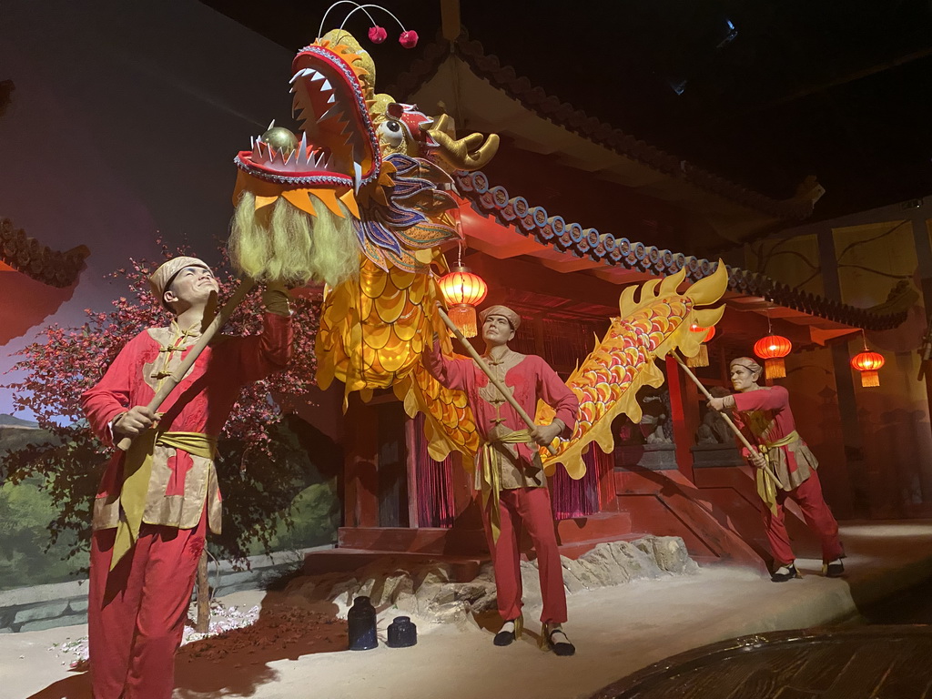 Statues and dragon at the Timor and China section of the boat ride at the World of Discoveries museum