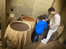 Miaomiao and Max with spices at the On the Deck room at the World of Discoveries museum