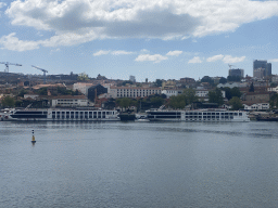 Boats on the Douro river and Vila Nova de Gaia, viewed from the Rua Nova da Alfândega street