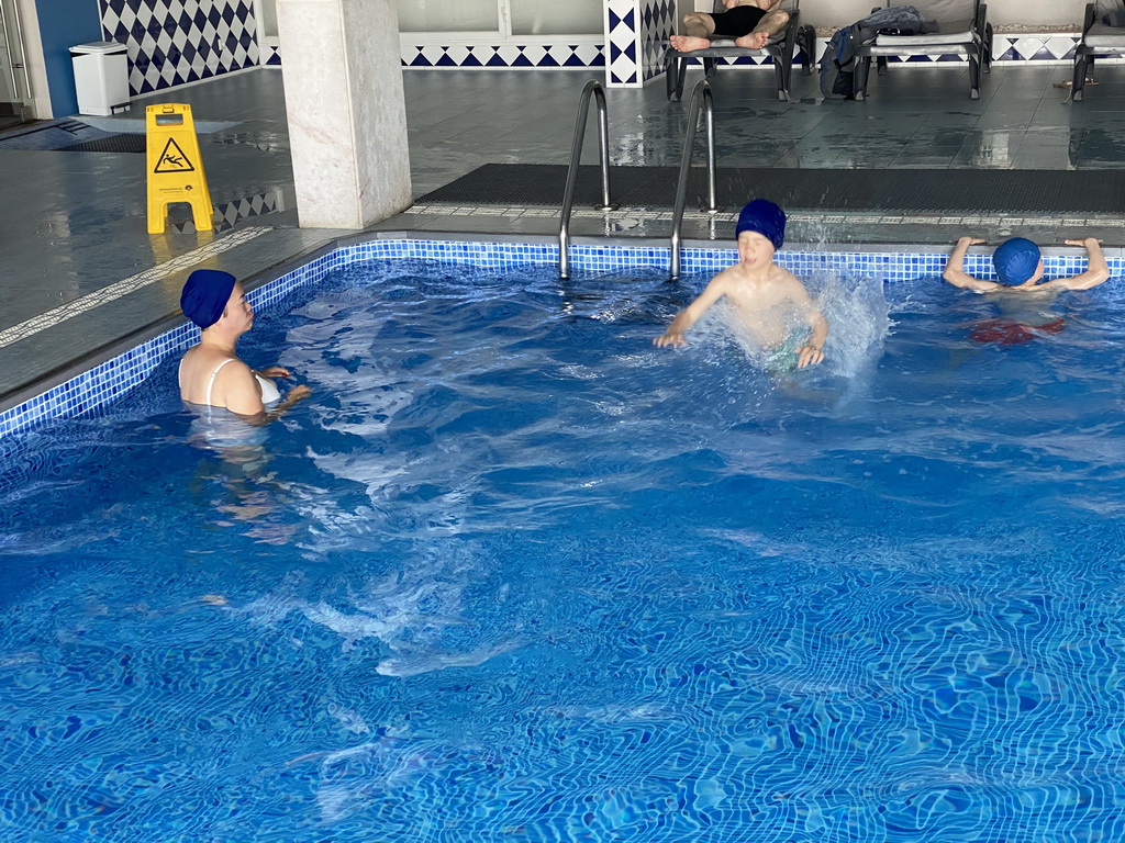 Miaomiao and Max at the swimming pool at the Hotel Vila Galé Porto