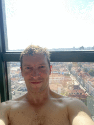 Tim at the swimming pool at the Hotel Vila Galé Porto, with a view on the city center