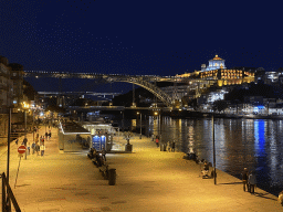 The Cais da Estiva street, the Ponte Luís I bridge over the Douro river and Vila Nova de Gaia with the Mosteiro da Serra do Pilar monastery, by night
