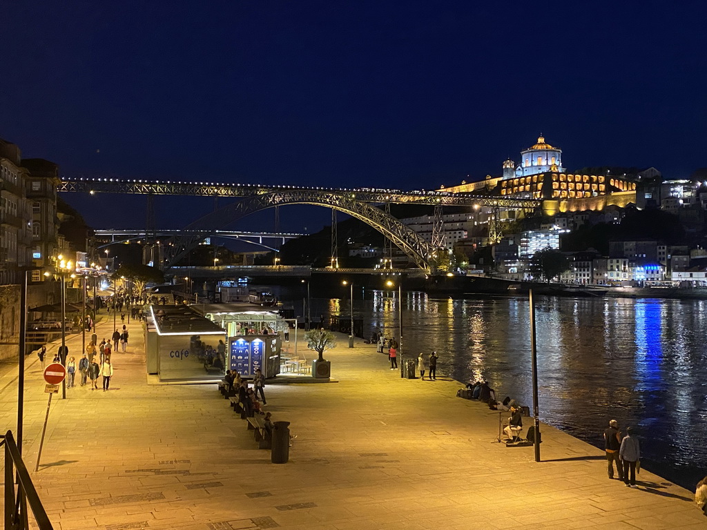 The Cais da Estiva street, the Ponte Luís I bridge over the Douro river and Vila Nova de Gaia with the Mosteiro da Serra do Pilar monastery, by night