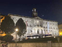 The Praça do Infante D. Henrique square with the front of the Palácio da Bolsa palace, by night