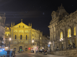 Front of the Igreja de Santo António dos Congregados church and the front of the São Bento Railway Station at the Praça de Almeida Garrett square, by night