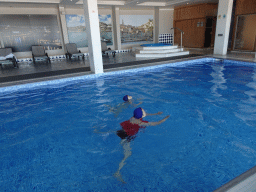 Miaomiao and Max at the swimming pool at the Hotel Vila Galé Porto