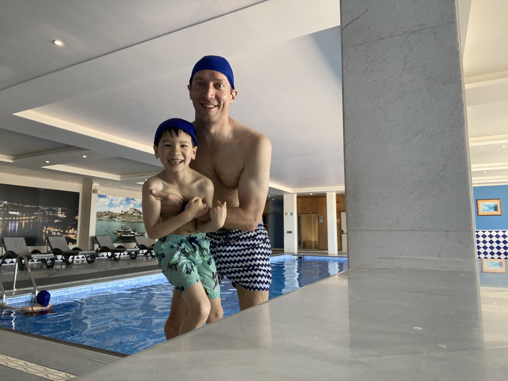 Tim, Miaomiao and Max at the swimming pool at the Hotel Vila Galé Porto