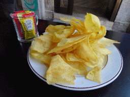 Chips at the terrace of the Casa Guedes Tradicional restaurant at the Passeio de São Lázaro street