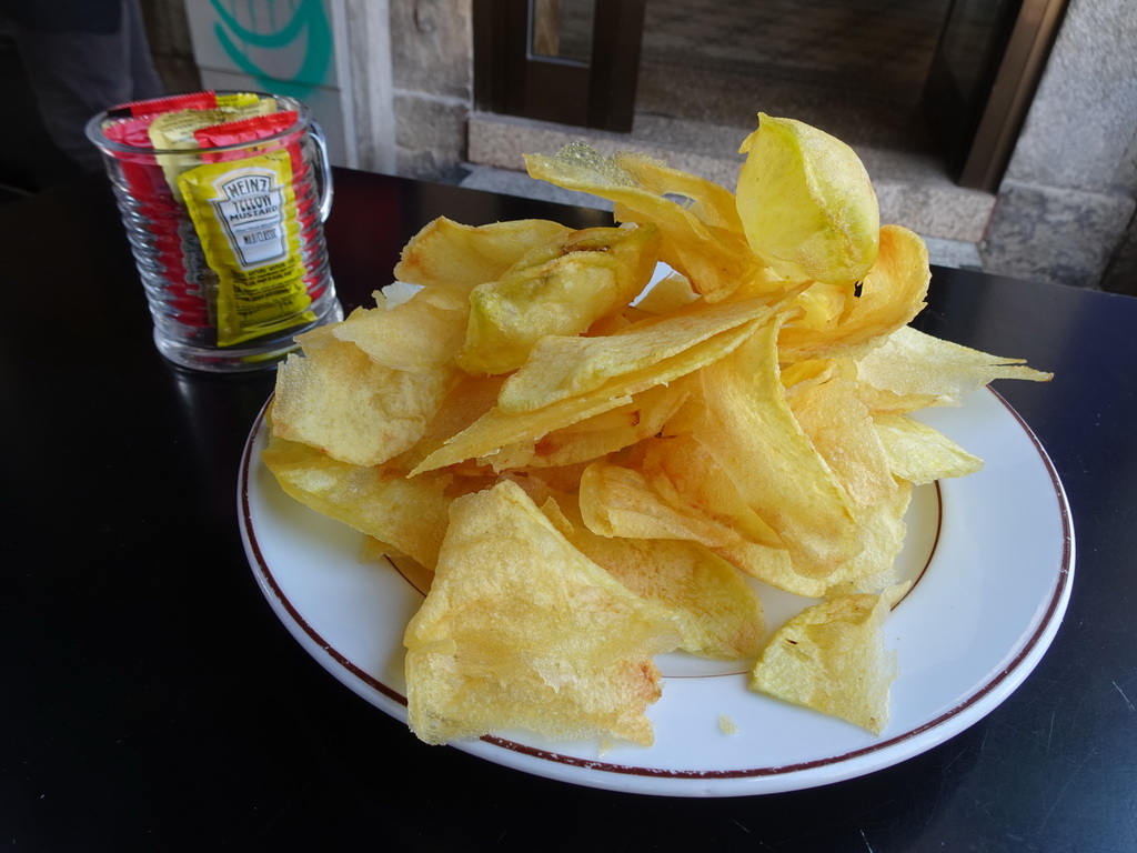 Chips at the terrace of the Casa Guedes Tradicional restaurant at the Passeio de São Lázaro street