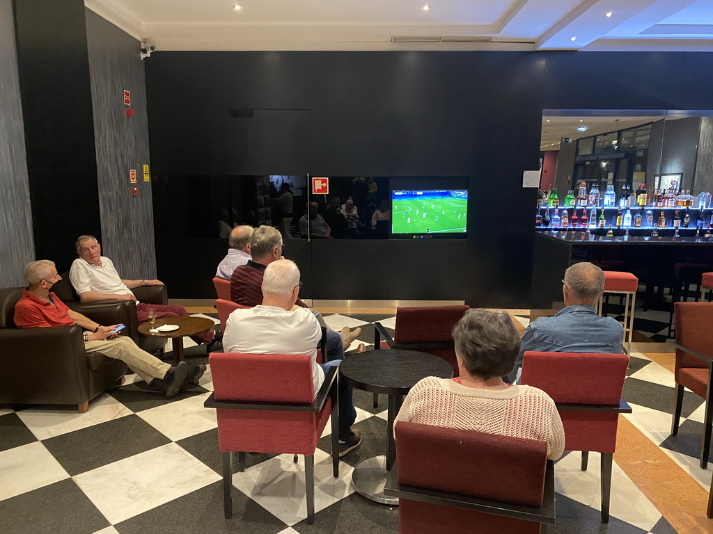 People in the lobby of the Hotel Vila Galé Porto watching the Champions League semi-final Real Madrid - Manchester City