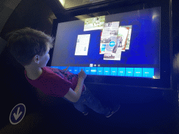 Max with an interactive TV screen at the FC Porto Museum at the Estádio do Dragão stadium
