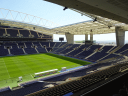 The pitch, dugouts and east grandstand of the Estádio do Dragão stadium, viewed from the board`s seats