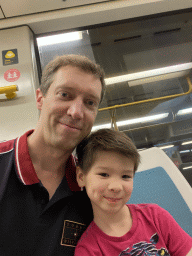 Tim and Max in the train at the Estádio do Dragão subway station