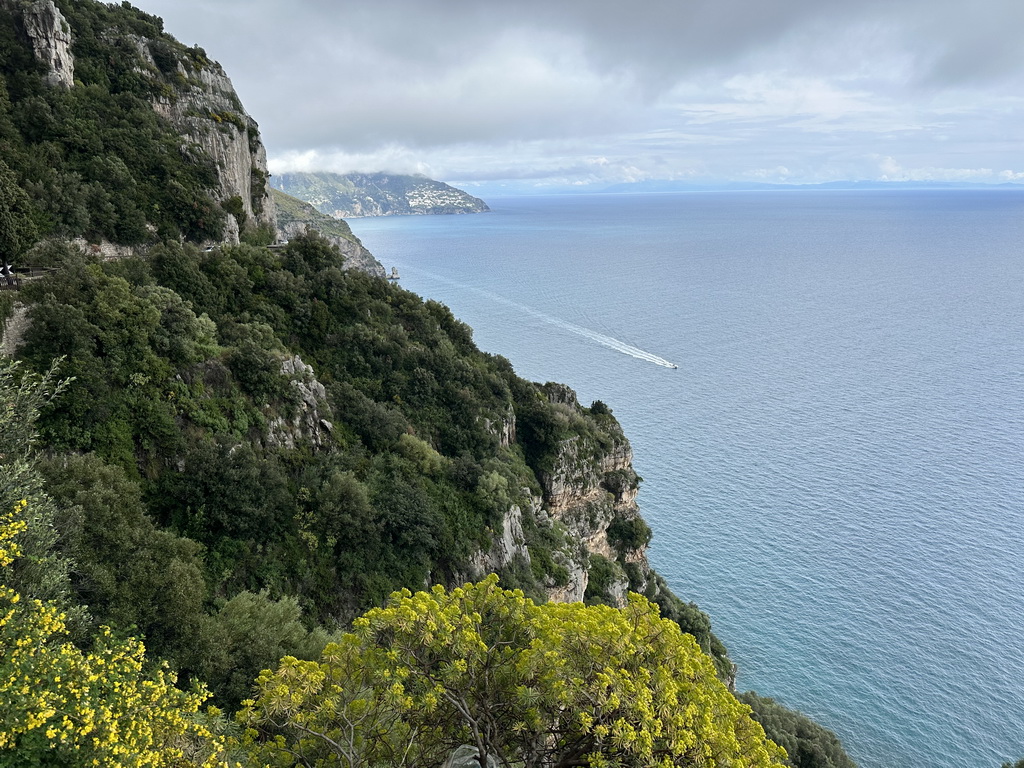 The town of Praiano and a boat in the Tyrrhenian Sea, viewed from viewpoint 5 at the Amalfi Drive