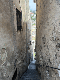 Staircase at the Via dei Gladioli street, with a view on the Chiesa di Santa Maria Assunta church