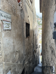 Staircase at the Via dei Gladioli street, with a view on the Chiesa di Santa Maria Assunta church