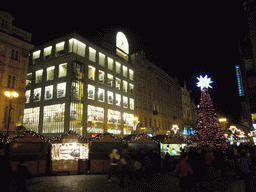 Wanceslas Square (Václavské námestí), with a shopping center and a christmas tree, by night