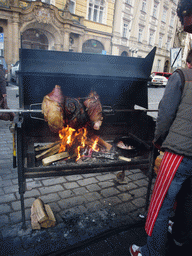 Meat being prepared at the christmas market at Old Town Square