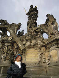 Miaomiao at the statue of Madonna with St. Bernard, at Charles Bridge