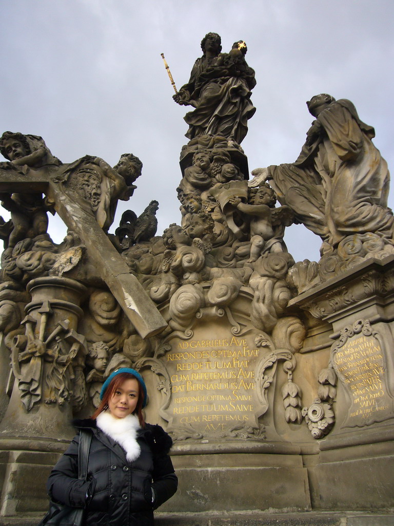 Miaomiao at the statue of Madonna with St. Bernard, at Charles Bridge
