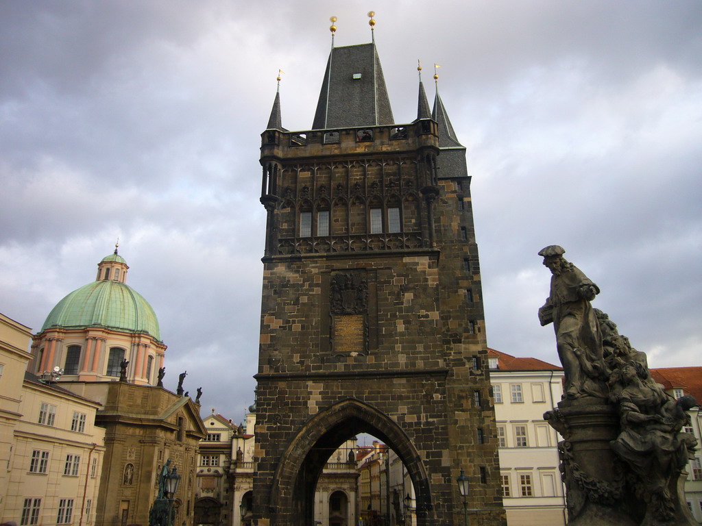 The Old Town Bridge Tower, St. Francis Seraphinus Church and the statue of St. Ivo, at Charles Bridge