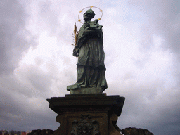 The statue of St. John of Nepomuk, at Charles Bridge