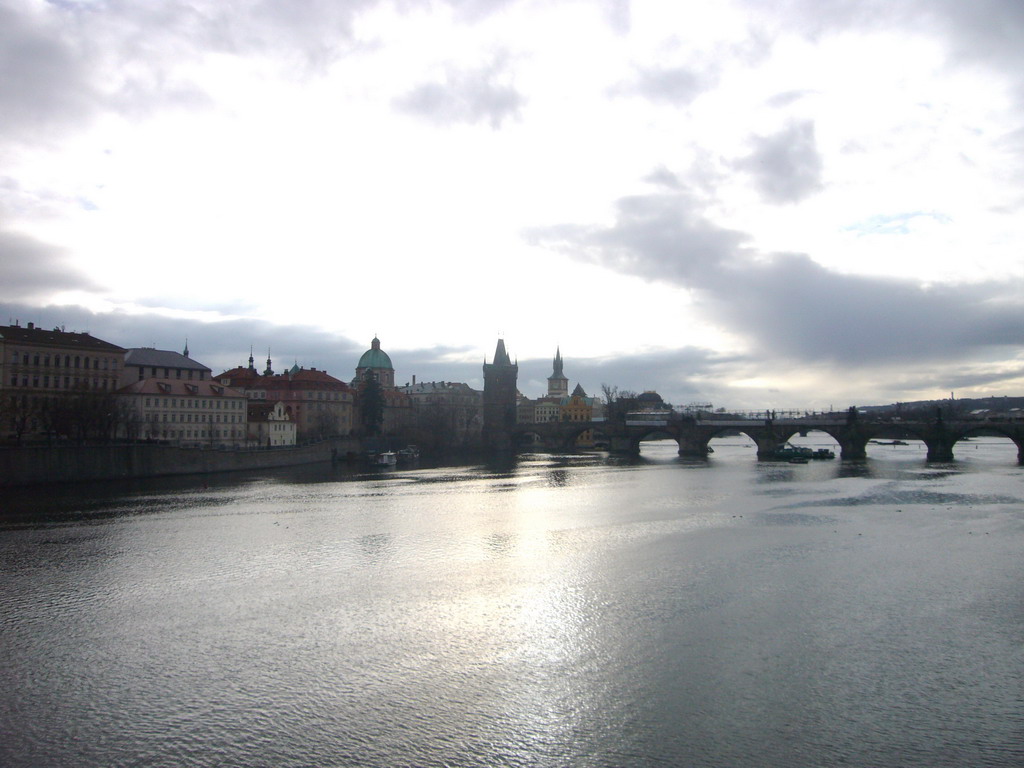 View on the St. Francis Seraphinus Church, the Old Town Bridge Tower, Charles Bridge and the Vltava river, from the Bridge of Legions