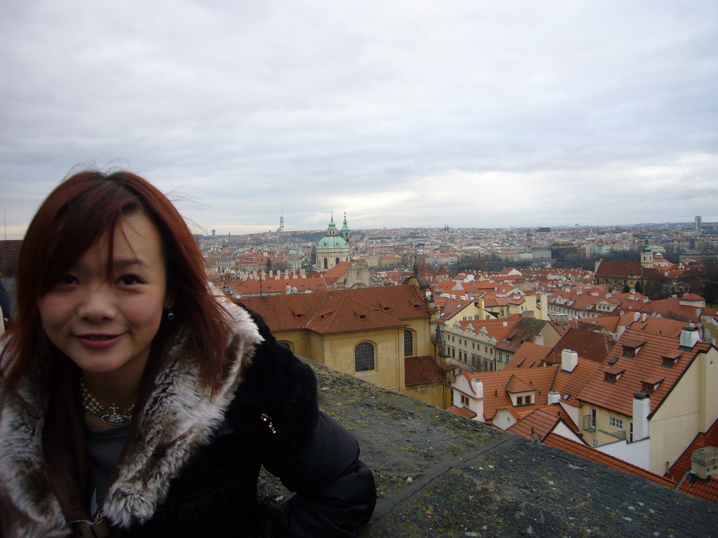 Miaomaio and a view on the city center from the entrance to Prague Castle