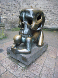The statue `Parable with a Skull` at the east side of Prague Castle, next to Daliborka Tower