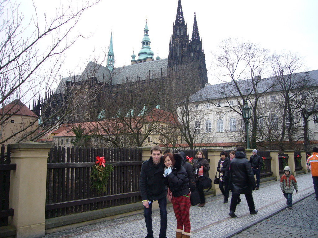 Tim and Miaomiao at the back side of Prague Castle, with the St. Vitus Cathedral and the Powder Tower