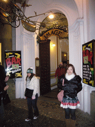 Miaomiao in front of the Black Light Theatre `Image`